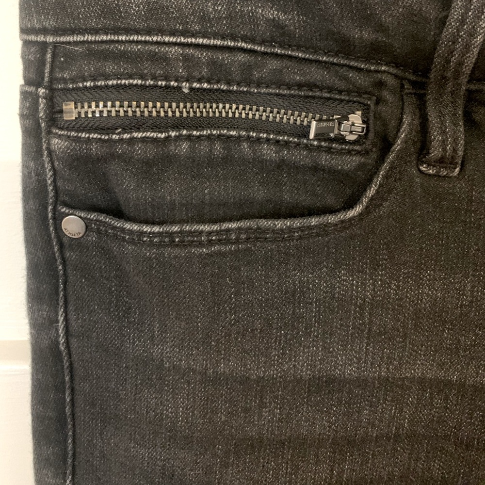 Athleta black distressed jeans. Size 10.